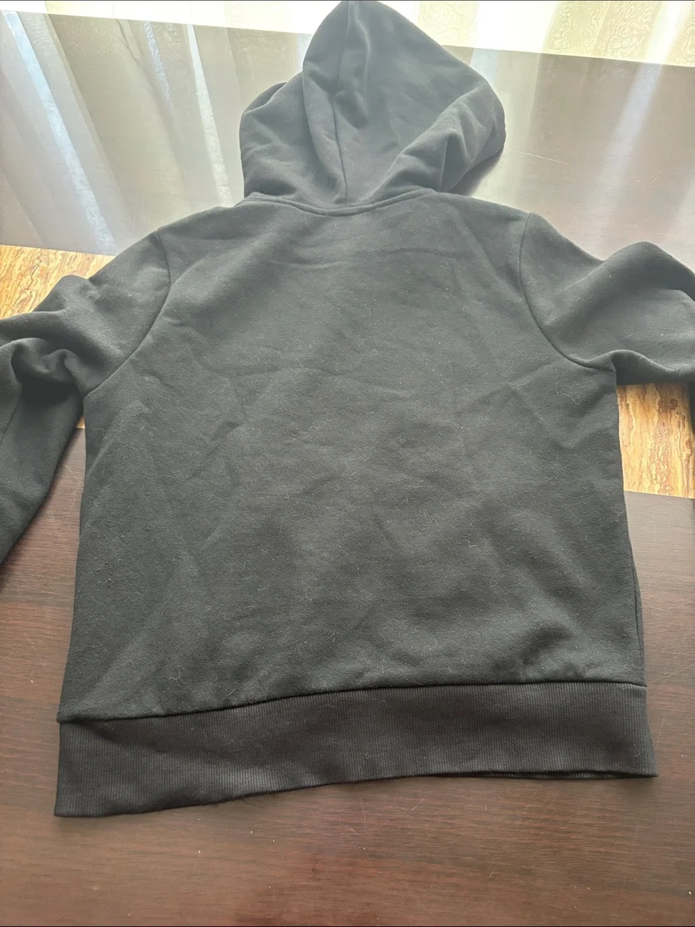 True Religion Black Pullover Hoodie with Gold Buddha Graphic